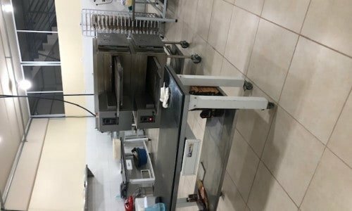 Pizzaria com cozinha central pronta para franquiar